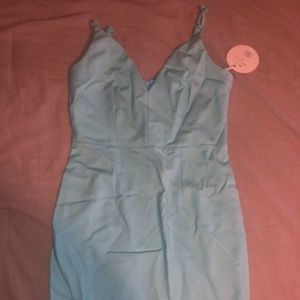 Light blue fitted dress with low neck